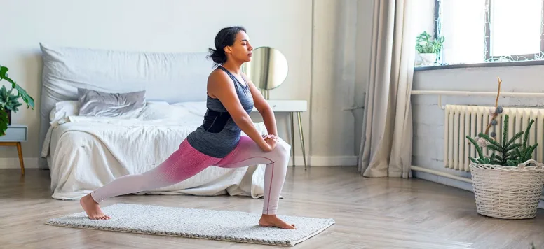 Woman makes stretching part of nurse workout schedule