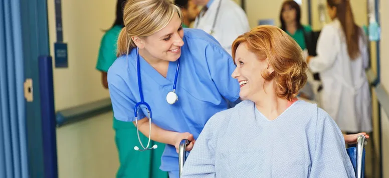 Nurse with patient in wheelchair