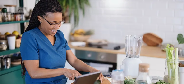 Nurse preparing meals for effective nutrition in nursing