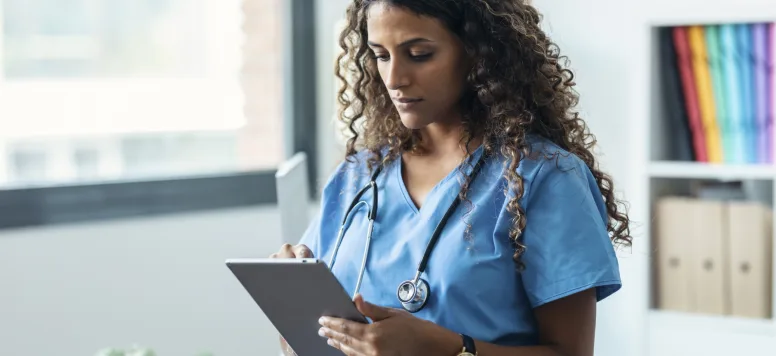 nurse with ipad