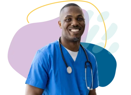 Male nurse in blue scrubs smiling