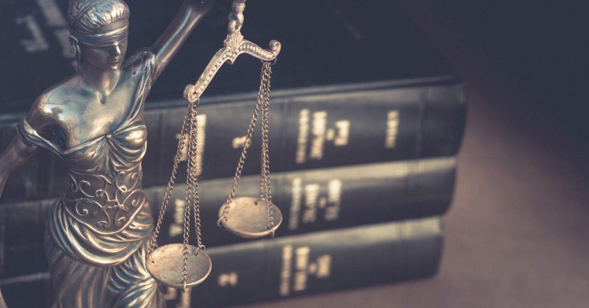 Legal concept image, scales of justice and books