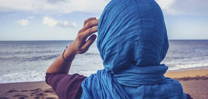 Woman looking out at the ocean