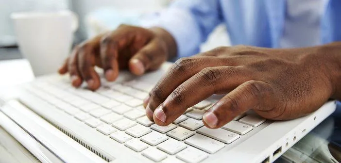 Nurse typing on a keyboard