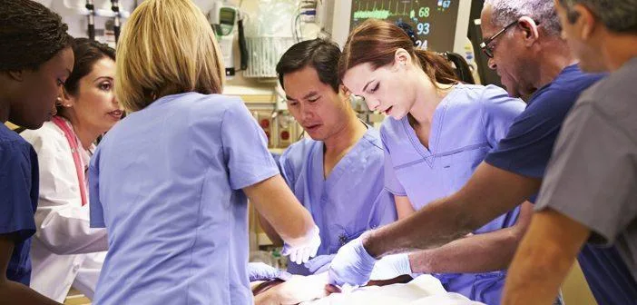 Nurses around a patient