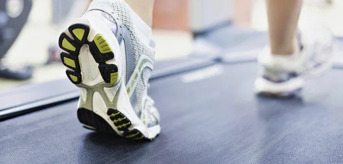 POV shoes walking on a treadmill