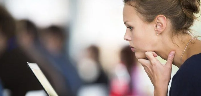 Nurse studying at a laptop