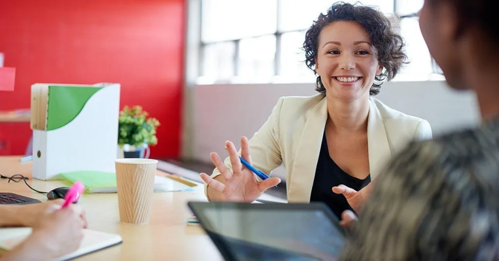 Woman-in-meeting-or-interview.jpg