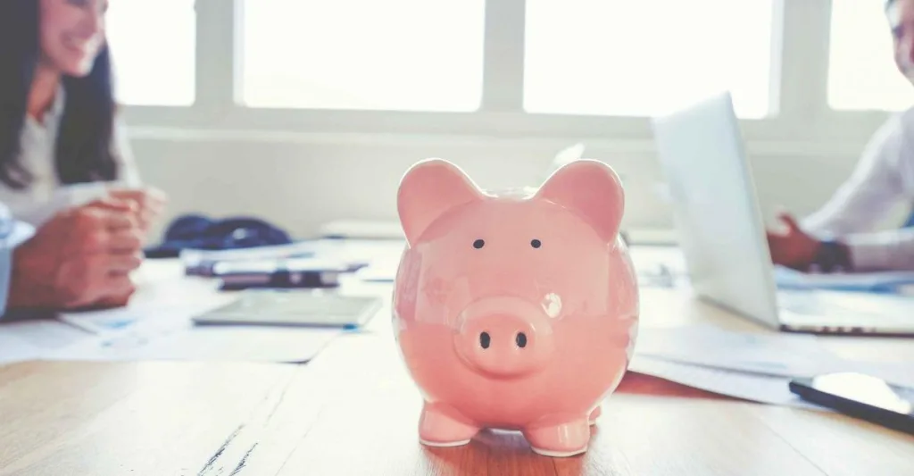 Piggy bank sitting on a desk