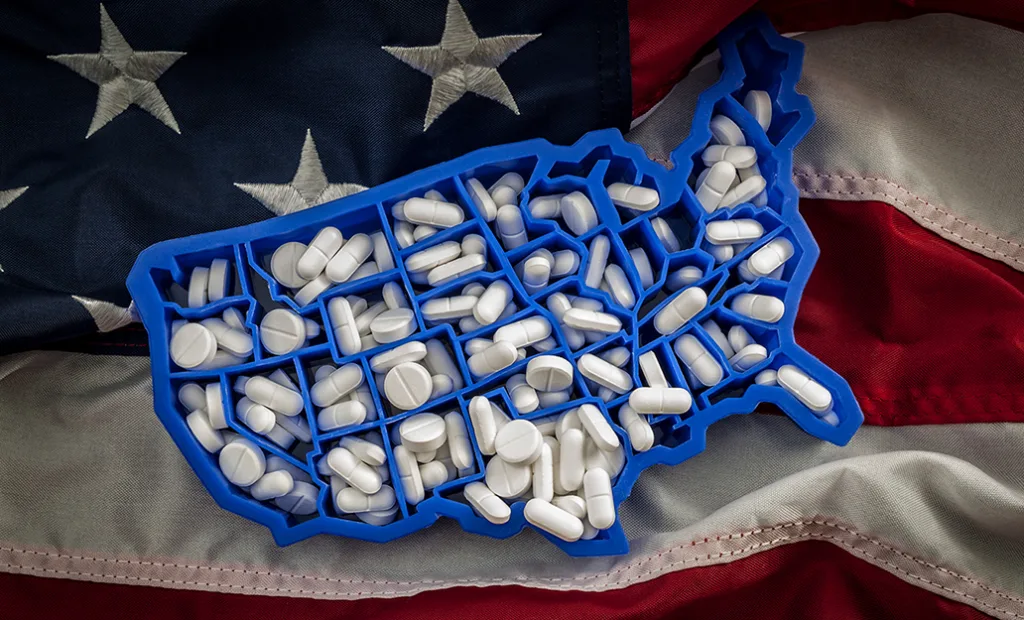 Pills-on-flag-FB-GettyImages-955505180.jpg