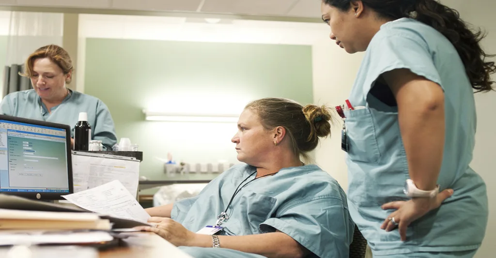 Nurses-looking-at-computer-screen-FB-GettyImages-107070771.jpg