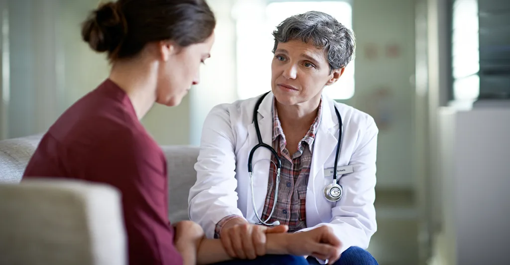 Nurse-with-sad-patient-FB-GettyImages-475780616.jpg