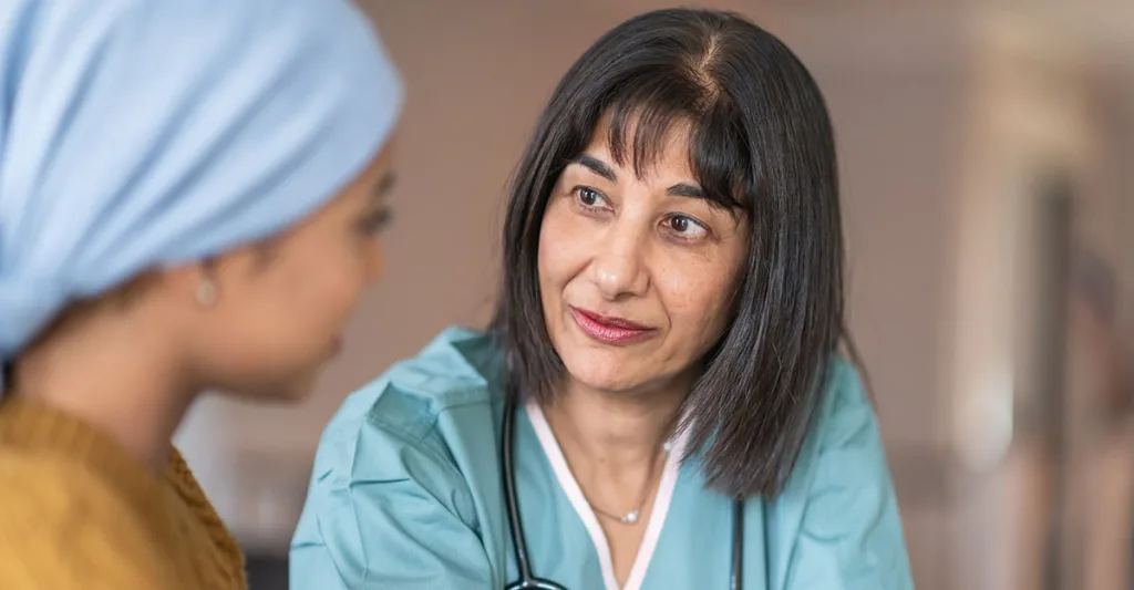 Nurse-with-cancer-patient-FB-GettyImages-1175131227.jpg