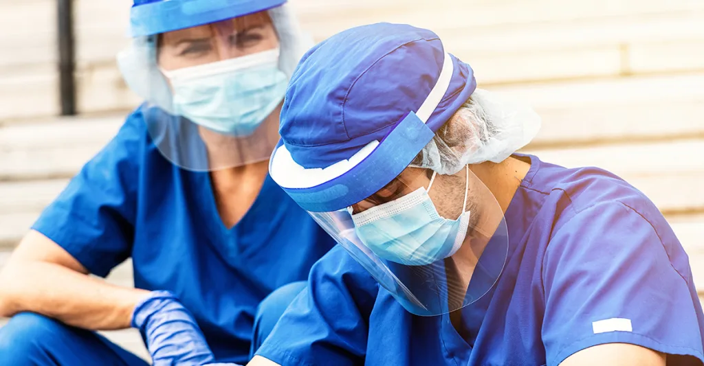 Nurse dressed in covid PPE