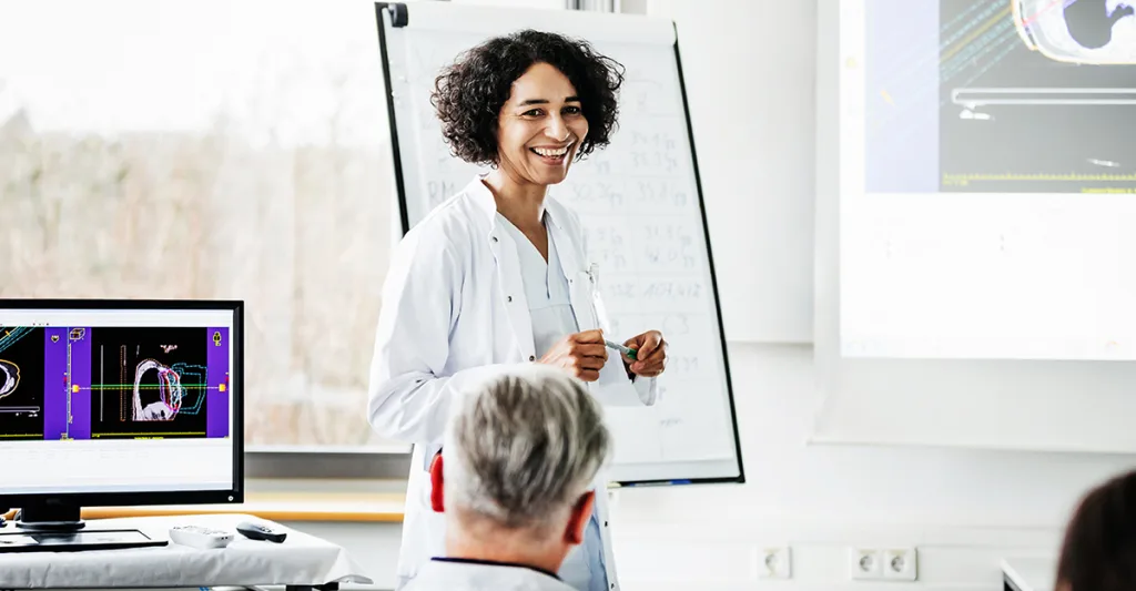 Female doctor professor in front of class