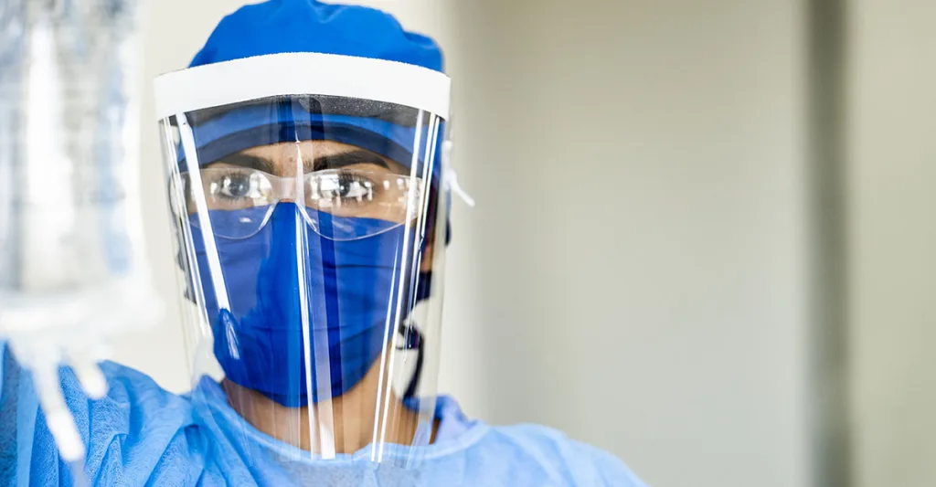 Nurse-with-PPE-FB-GettyImages-1222085056.jpg