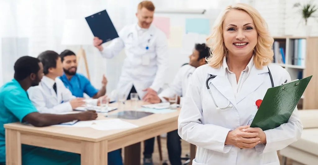 Nurse-wearing-lab-coat-GettyImages-903354748.jpg