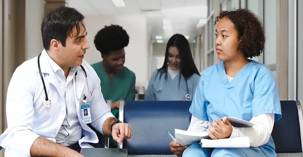 Nursing-student-and-teacher-GettyImages-1389102161.jpg