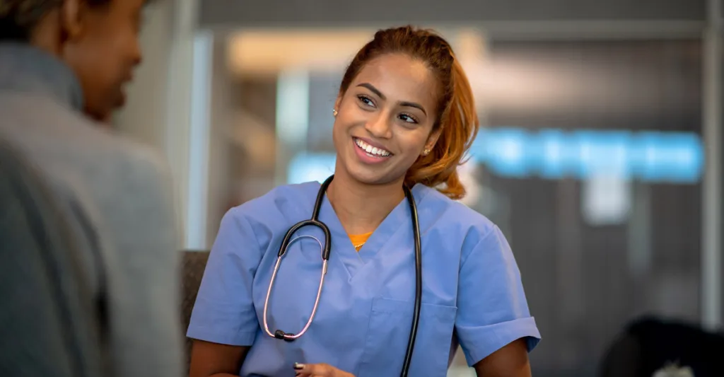 Nurse talking with patient