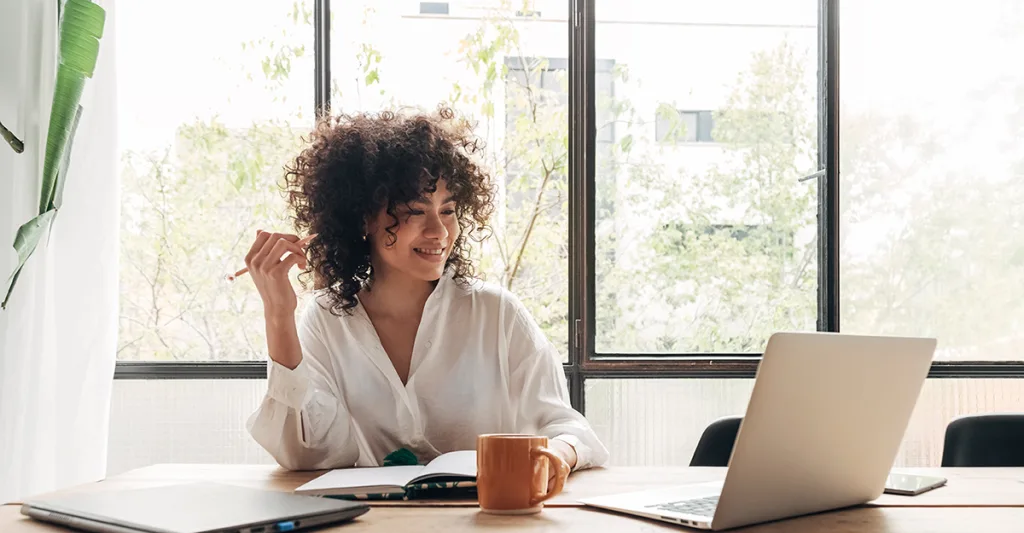 Woman learning on a laptop