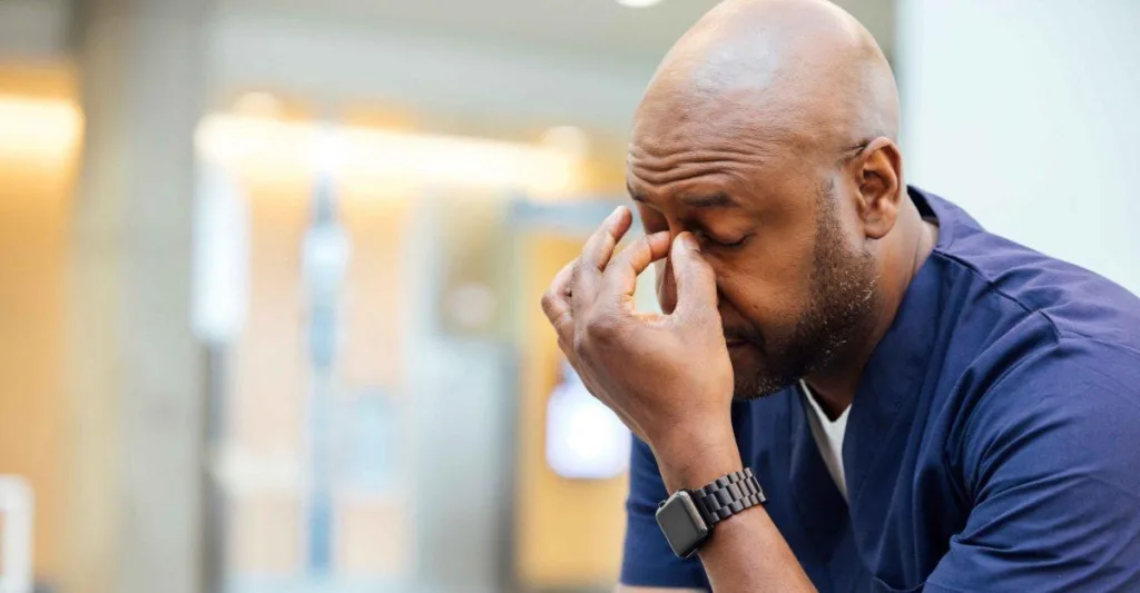 Stressed out male nurse