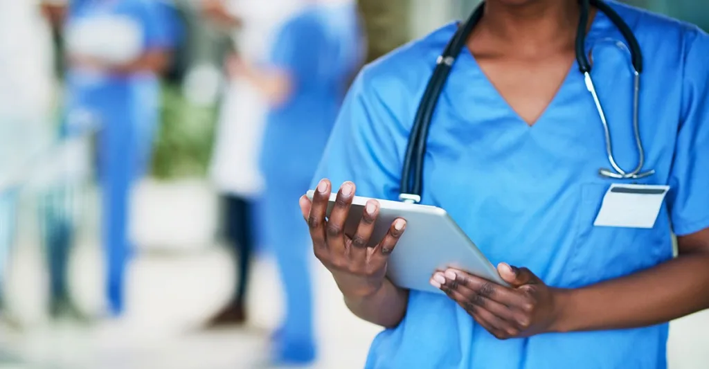 Nurse holding tablet