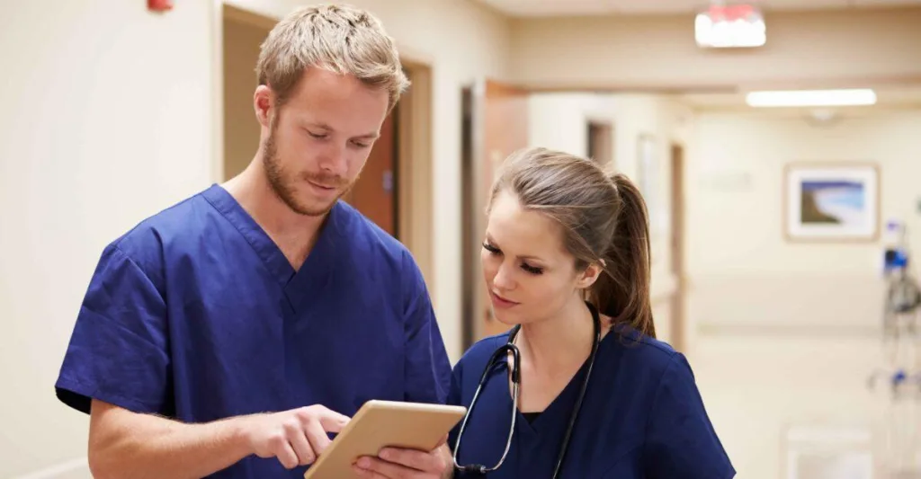 Nurses looking at tablet