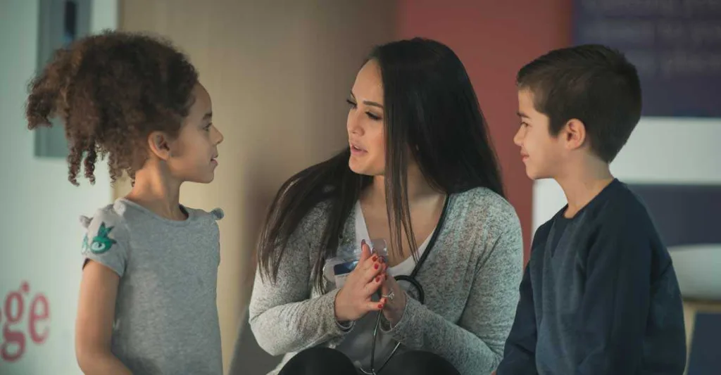 Mother talking to her daughter and son