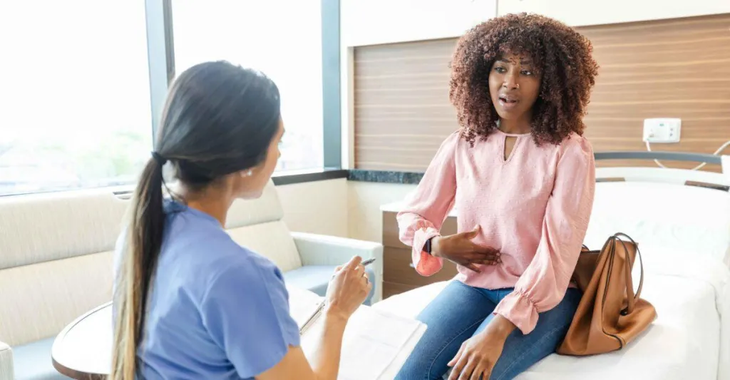 Nurse assessing a patient