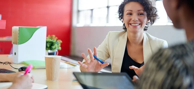 Woman-in-meeting-or-interview.jpg