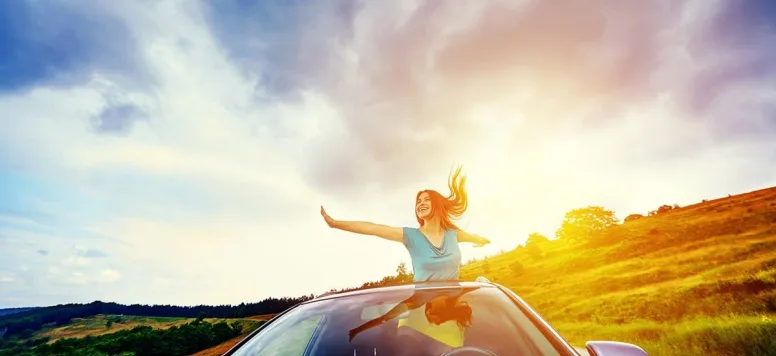 Woman-in-convertible-iStock-493694776.jpg