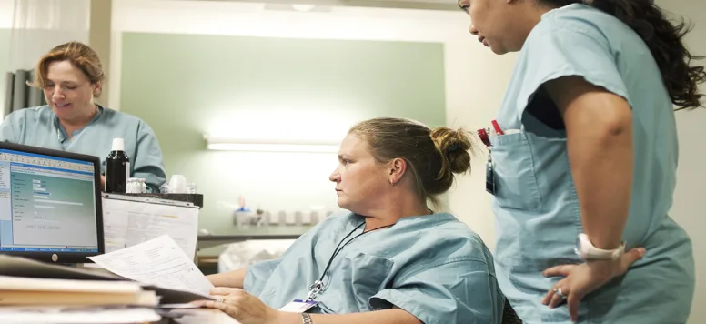 Nurses-looking-at-computer-screen-FB-GettyImages-107070771.jpg