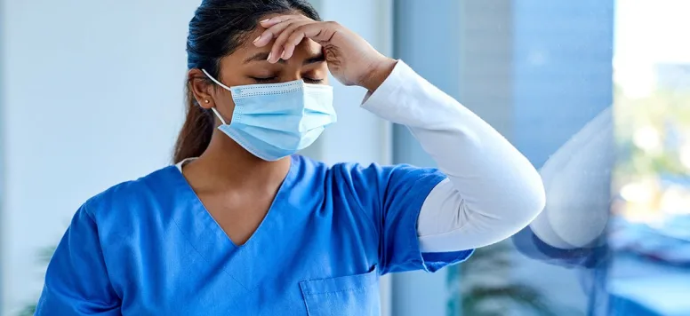Nurse-wearing-mask-GettyImages-1299756131-web.jpg