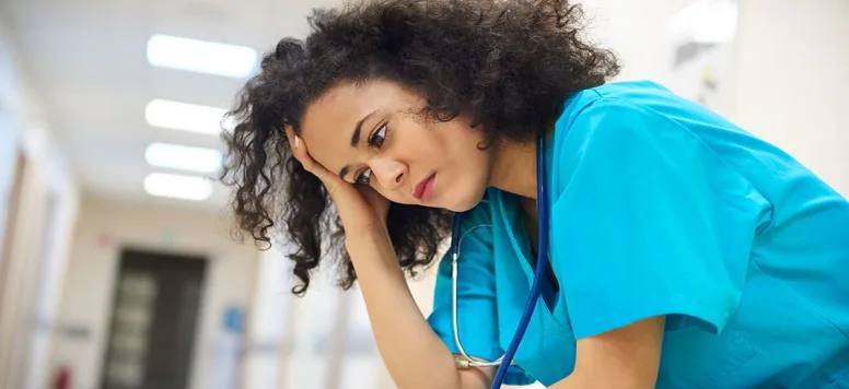 Nurse-looking-upset-or-depressed-GettyImages-639825234-web.jpg