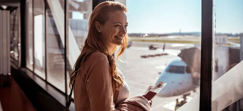 Woman-at-airport-GettyImages-1210810061-web.jpg