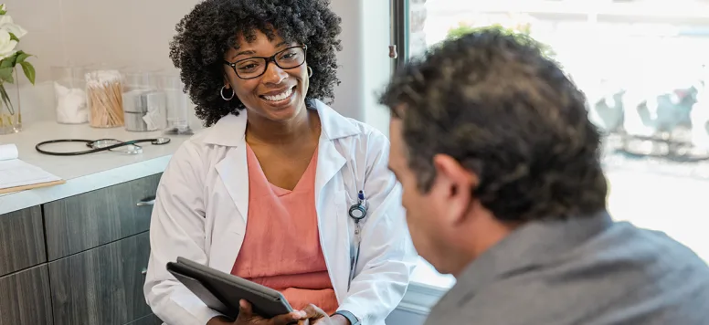 Nurse-or-nurse-practitioner-with-patient-GettyImages-1405683434.jpg