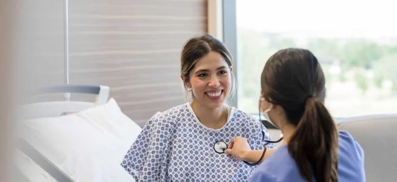 Nurse taking patients hearrate