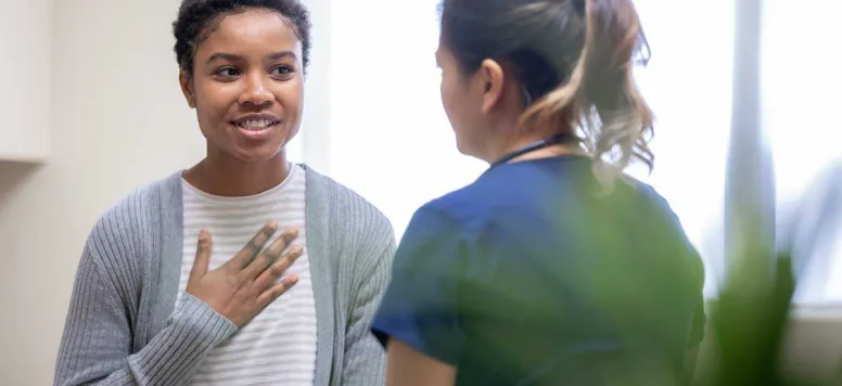 Nurse talking with patient