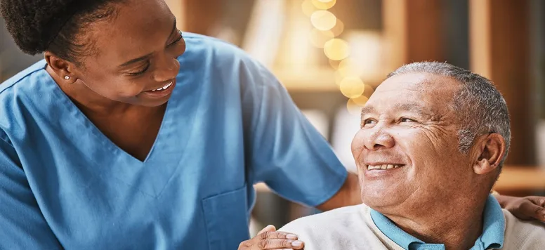 Nurse smiling with patient