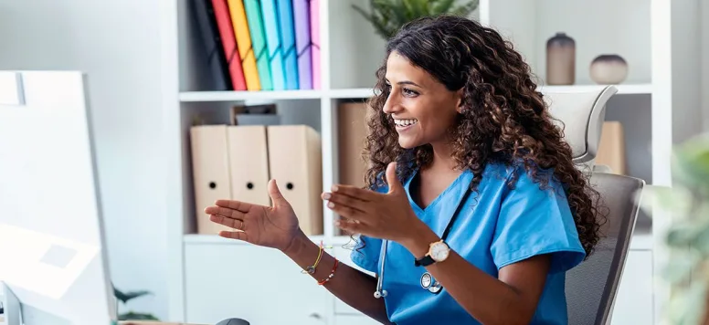 Nurse on laptop video call