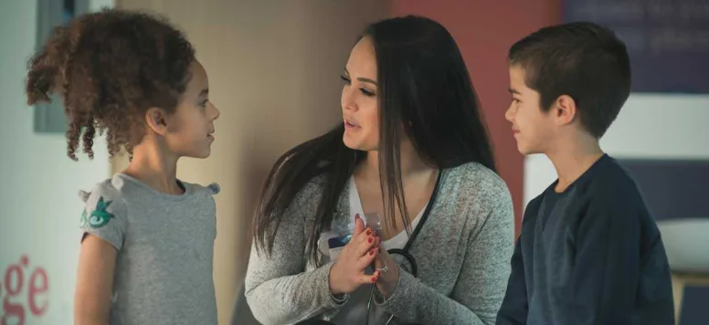 Mother talking to her daughter and son