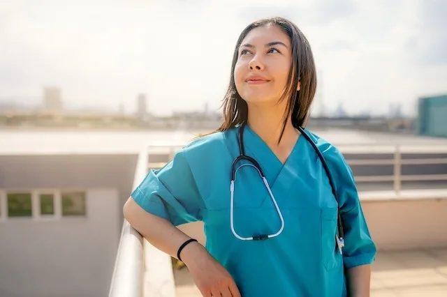 Nurse outside critically thinking