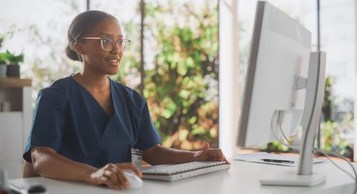 Nurse on computer