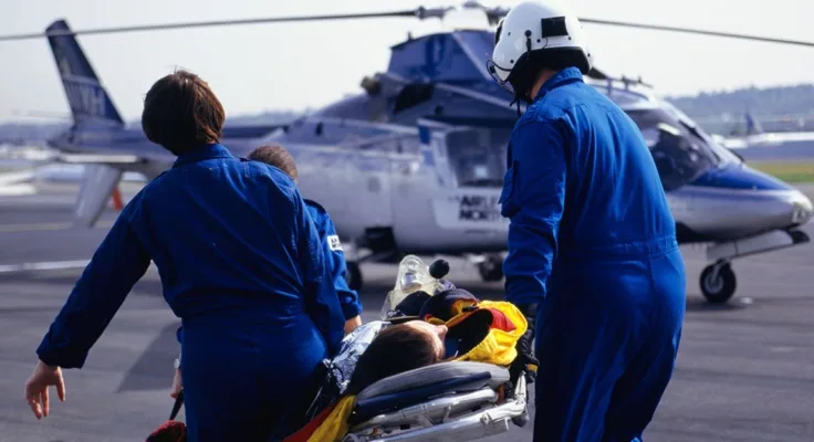 flight nurse working with a team