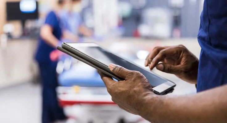 Nurse using iPad