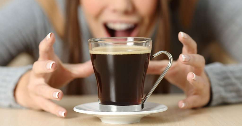Nurse grabbing for coffee mug