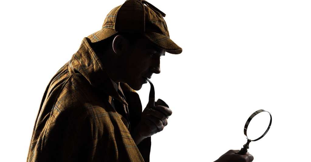 Detective with magnifying glass