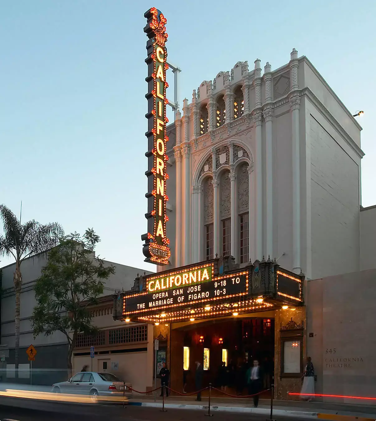 California Theatre in San Jose near the Silicon Valley homes for sale. Theatre’s lights are lit up before the opera show.