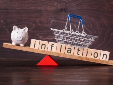 inflation tipping piggy bank
