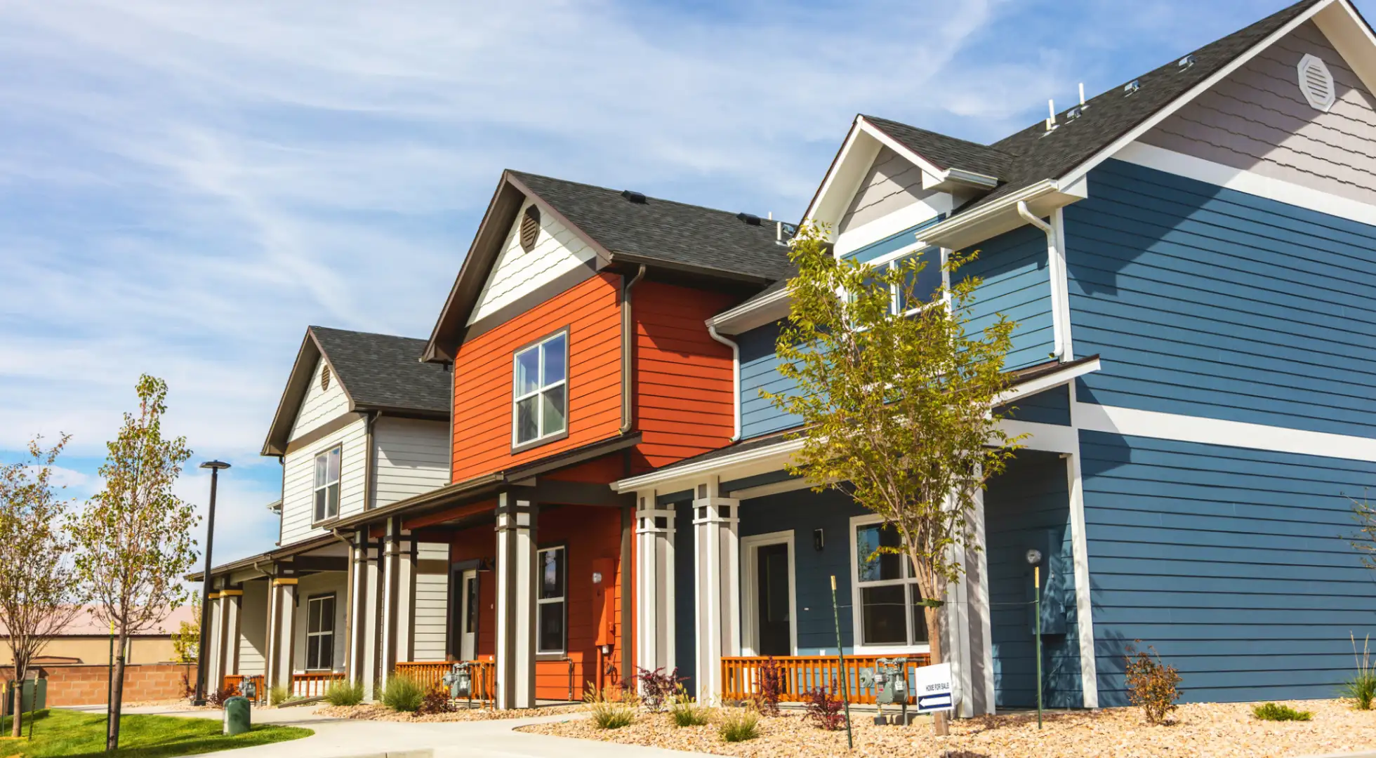 A row of colorful multifamily units.